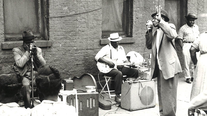 Black and white photograph of blues musicians including James Brewer.